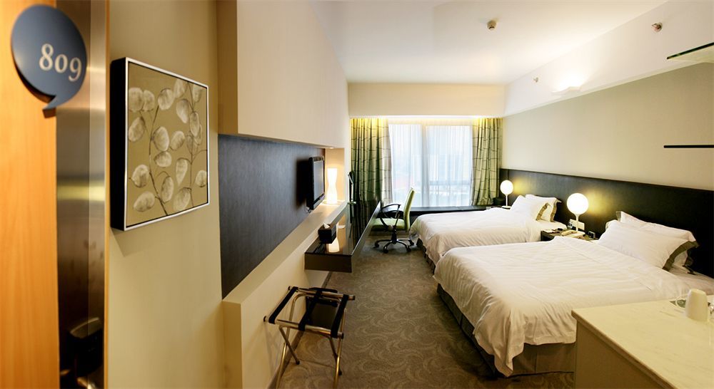Yi-Wu Commatel Hotel Guangzhou Exterior foto